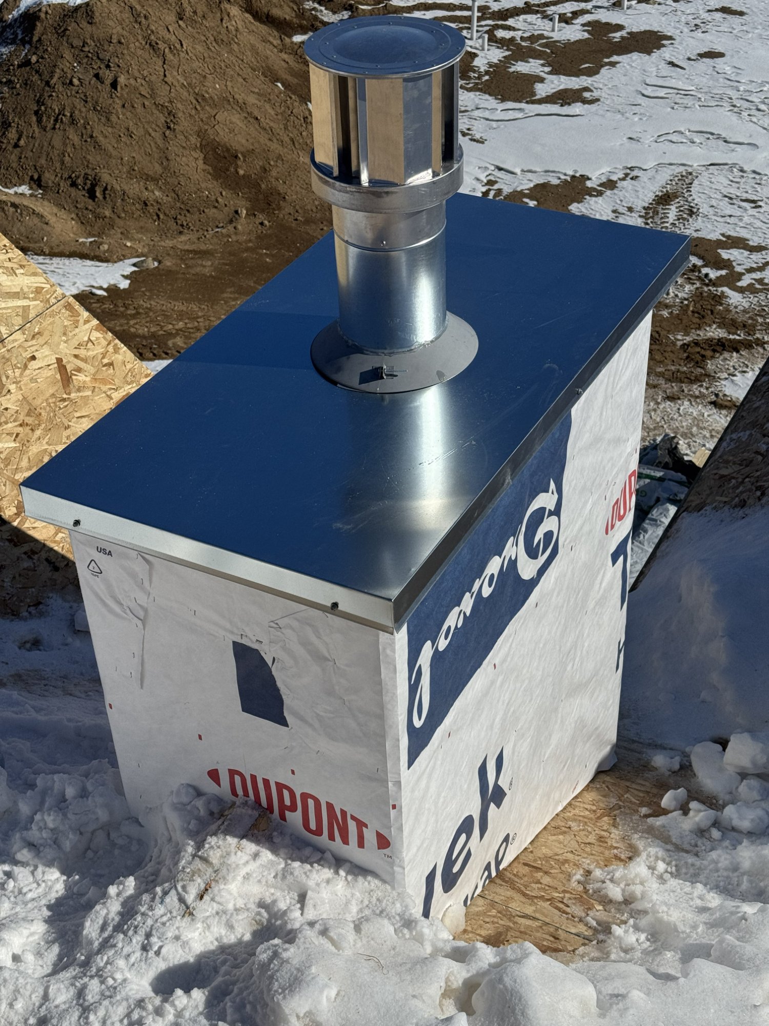 New chase cover installation on new construction home — Madison, WI winter